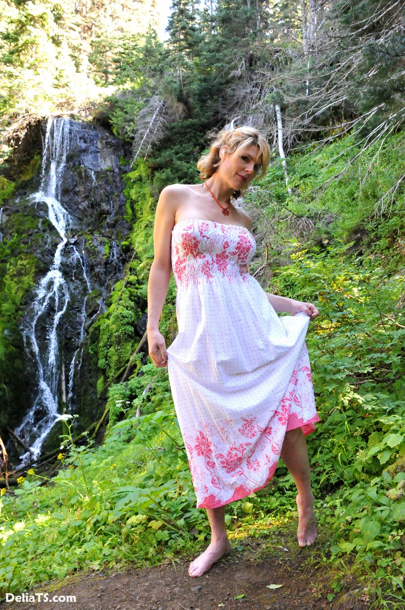 Pretty Delia Erect Under Dress By A Waterfall Photo 2