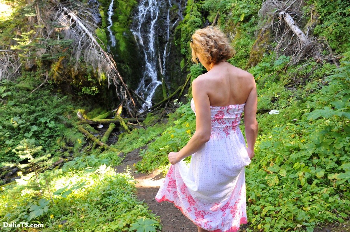 Pretty Delia Erect Under Dress By A Waterfall Photo 7